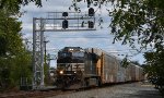 NS 11J is westbound with autoracks on Main 2 at Roycefield Rd